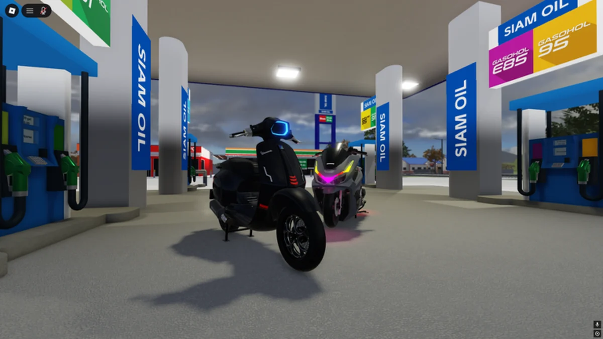 Official Mahanakhon Racing motorcycles at a gas station